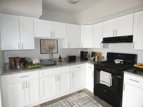 this is a photo of the kitchen in a 1 bedroom apartment at deer hill apartments in c